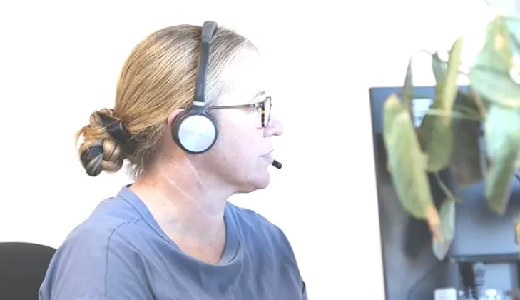 Community Care TASMANIA team member on a phone call